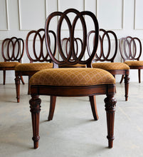 Load image into Gallery viewer, Thomasville Ernest Hemingway Collection 9-piece dining set. Designed with classic European influences and the relaxed sophistication that defines the Ernest Hemingway Collection, this complete dining suite features a beautifully figured mahogany extension table paired with six sculptural loop-back side chairs and two generously proportioned host armchairs. Good Bones Furniture
