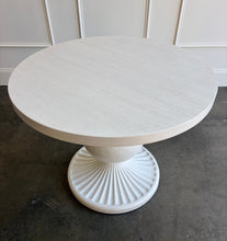Load image into Gallery viewer, The Marco Center Table from Tommy Bahama’s Ocean Breeze collection pairs a clean round top with a sculptural pedestal base. Its urn-shaped center and radiating fluted base give the table graceful architectural detail while maintaining a relaxed, versatile appearance. Professionally lacquered in the color of your choice by Good Bones Furniture.
