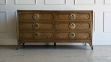 Load image into Gallery viewer, This handsome six-drawer dresser by Vanguard Furniture blends tailored lines with refined transitional styling. Crafted with beautifully grained oak veneers, it features sculpted drawer fronts, oversized antiqued brass ring pulls, and elegantly tapered legs that give the piece a sophisticated presence. Good Bones Furniture
