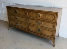 Load image into Gallery viewer, This handsome six-drawer dresser by Vanguard Furniture blends tailored lines with refined transitional styling. Crafted with beautifully grained oak veneers, it features sculpted drawer fronts, oversized antiqued brass ring pulls, and elegantly tapered legs that give the piece a sophisticated presence. Good Bones Furniture

