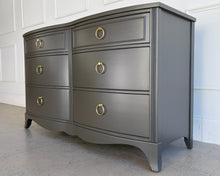 Load image into Gallery viewer, Angled right view of a vintage six drawer dresser in Sherwin Williams Urbane Bronze, showcasing original proportions, satin lacquer finish, and solid brass ring pulls by Good Bones Furniture in Raleigh, NC.
