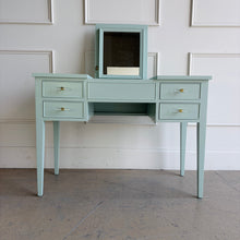 Load image into Gallery viewer, This vintage Craftique vanity has been professionally refinished in a custom light teal lacquer, giving the classic form a fresh, tailored look. Clean lines and tapered legs reflect the refined simplicity Craftique furniture is known for, while new lucite and brass hardware adds a subtle touch of modern glamour. Good Bones Furniture
