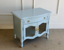 Load image into Gallery viewer, Professionally lacquered in Farrow &amp; Ball Parma Gray, this pair of vintage French nightstands blends classic European styling with a softer, more modern palette. The elegant cabriole legs, shaped apron, and bombe-inspired silhouette give the pieces timeless character, while the muted blue-gray lacquer creates a fresh, elevated look suited for both traditional and contemporary interiors. Good Bones Furniture
