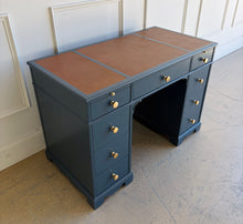 Load image into Gallery viewer, This vintage desk has been professionally lacquered in Farrow &amp; Ball Hague Blue, giving the classic form a rich, tailored presence. The leather inset top adds warmth and contrast, while new brass knobs provide a refined finishing touch. Good Bones Furniture
