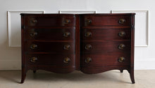 Load image into Gallery viewer, Graceful curves and timeless craftsmanship define this vintage mahogany dresser. Featuring a distinctive serpentine front with eight spacious drawers, this piece offers elegant proportions and exceptional storage while maintaining a refined footprint. Traditional bracket feet, classic oval brass hardware, and rich mahogany construction give the dresser a sophisticated presence that works beautifully in both traditional and transitional interiors. Good Bones Furniture
