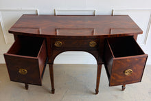 Load image into Gallery viewer, This vintage Maitland-Smith sideboard showcases the brand’s renowned craftsmanship and elegant neoclassical styling. Crafted with richly figured mahogany veneers, the serpentine front and graceful arched apron create a sophisticated silhouette, while brass lion-head hardware and tapered inlaid legs add refined details throughout. Good Bones Furniture
