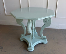 Load image into Gallery viewer, restored vintage foyer table. Professionally refinished in a custom mint green lacquer, this charming octagonal accent table pairs graceful neoclassical styling with a crisp contemporary finish. The sculptural pedestal base features scrolling supports, carved acanthus leaf details, and turned center elements that create visual interest from every angle. Good Bones Furniture
