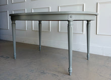 Load image into Gallery viewer, This vintage Thomasville dining table features a clean oval silhouette, tapered fluted legs, and understated neoclassical detailing that gives it a tailored, architectural presence without feeling overly formal. Custom lacquered in Lauriston Stone. Good Bones Furniture
