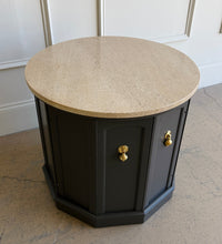 Load image into Gallery viewer, This vintage end table has been professionally refinished in Sherwin-Williams Urbane Bronze, creating a sophisticated contrast against its natural travertine stone top. The rich charcoal finish highlights the table's distinctive faceted silhouette while allowing the warm tones and organic texture of the travertine to take center stage. Good Bones Furniture
