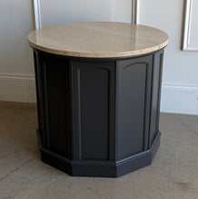Load image into Gallery viewer, This vintage end table has been professionally refinished in Sherwin-Williams Urbane Bronze, creating a sophisticated contrast against its natural travertine stone top. The rich charcoal finish highlights the table's distinctive faceted silhouette while allowing the warm tones and organic texture of the travertine to take center stage. Good Bones Furniture

