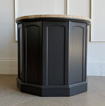 Load image into Gallery viewer, This vintage end table has been professionally refinished in Sherwin-Williams Urbane Bronze, creating a sophisticated contrast against its natural travertine stone top. The rich charcoal finish highlights the table's distinctive faceted silhouette while allowing the warm tones and organic texture of the travertine to take center stage. Good Bones Furniture
