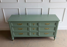 Load image into Gallery viewer, This vintage seven drawer dresser by White Furniture Co. showcases the exceptional craftsmanship and timeless proportions that made the North Carolina manufacturer one of America's most respected furniture makers. Professionally lacquered in custom light green, this piece can complement everything from traditional interiors to today's transitional and modern homes. Good Bones Furniture
