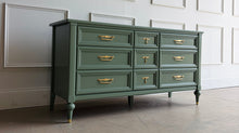 Load image into Gallery viewer, This vintage seven drawer dresser by White Furniture Co. showcases the exceptional craftsmanship and timeless proportions that made the North Carolina manufacturer one of America's most respected furniture makers. Professionally lacquered in custom light green, this piece can complement everything from traditional interiors to today's transitional and modern homes. Good Bones Furniture
