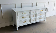 Load image into Gallery viewer, This vintage seven drawer dresser by White Furniture Co. showcases the exceptional craftsmanship and timeless proportions that made the North Carolina manufacturer one of America's most respected furniture makers. Professionally lacquered in White Dove by Benjamin Moore, this piece can complement everything from traditional interiors to today's transitional and modern homes. Good Bones Furniture
