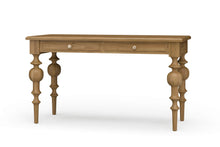Load image into Gallery viewer, Front view of the Vivienne Desk in Antique French Oak finish by Bramble, a mahogany writing desk with sculptural turned legs and two drawers, crafted in Indonesia and offered by Good Bones Furniture to customers across the United States.
