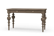 Load image into Gallery viewer, Front view of the Vivienne Desk in Birch finish by Bramble, a mahogany writing desk with sculptural turned legs and two drawers, crafted in Indonesia and offered by Good Bones Furniture to customers across the United States.
