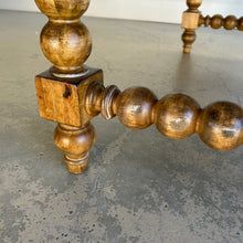 Load image into Gallery viewer, The Wellmington Coffee Table is a beautiful statement piece that brings both character and functionality to any living space. Crafted from solid Mango wood, it features stunning large bobbin legs and cross braces that highlight its traditional craftsmanship. The substantial square design ensures ample surface area, making it perfect for both decorative displays and everyday use. Good Bones Furniture
