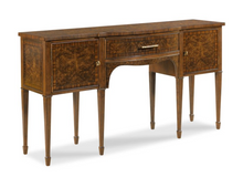Load image into Gallery viewer, Inspired by elegant 18th-century English furniture, the Henley Serving Console by Woodbridge Furniture blends timeless craftsmanship with sophisticated materials. Rich amboyna burl veneers adorn the top, drawer front, doors, and side panels, creating dramatic movement and depth that immediately captures attention. Ebony string inlay and finely figured cherry veneers frame the burl panels, highlighting the exceptional attention to detail throughout. Good Bones Furniture
