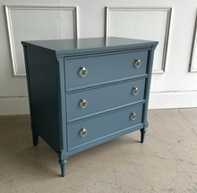 Load image into Gallery viewer, Boylan 3 Drawer Bedside Chest in Sherwin-Williams Rain Cloud by Good Bones Furniture, featuring solid mahogany construction, three soft-close drawers, and a tailored, heirloom-quality profile.
