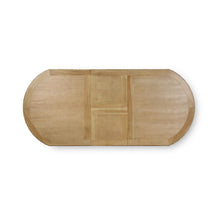 Load image into Gallery viewer, Top view of the Grosvenor butterfly oval extension dining table showing the integrated butterfly leaf extension within the solid wood top.
