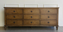 Load image into Gallery viewer, Milano 9-drawer dresser in Driftwood by Good Bones Furniture, a softly weathered wood finish offering relaxed luxury bedroom storage
