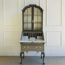 Load image into Gallery viewer, Queen Anne–style vintage secretary with glass-front upper cabinet and lacquered exterior, blending display storage and writing desk functionality
