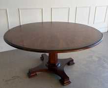 Load image into Gallery viewer, Angled view of the Stanley Furniture Co. dining table emphasizing the pedestal base and classic round tabletop profile.
