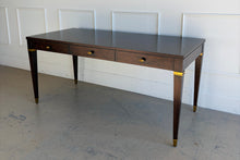 Load image into Gallery viewer, Wide angled view of the Theodore Alexander Bradbury Desk emphasizing its Art Deco–inspired proportions, three-drawer layout, and refined Cambridge finish at Good Bones Furniture in Raleigh, NC.
