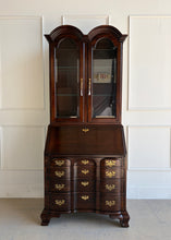 Load image into Gallery viewer, Vintage Hooker Secretary in rich mahogany finish with double-arched crown, glass display doors, brass hardware, and classic drop-front writing desk, available at Good Bones Furniture.
